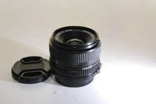 Canon 28mm f2.8 lens FD manual focus rated B 0082966211836  