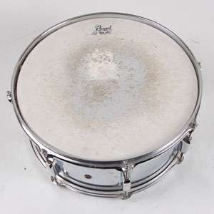 Snare drum is used and is in good condition has seen use.