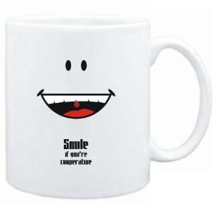   Mug White  Smile if youre cooperative  Adjetives