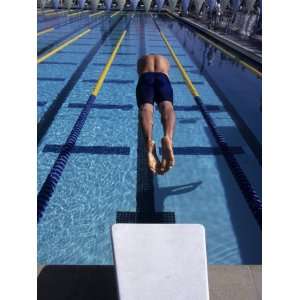  Swimmer Diving Off the Starting Blocks to Begin a Race 