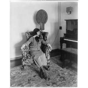   Miss Sylvia Fisch listening in to radio program,c1923