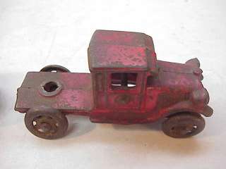 ANTIQUE AC WILLIAMS CAST IRON TRUCK STAKE TRAILER toy  