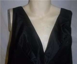   HALTER DRESS WITH LIGHT CATCHING SEQUINS & WAIST RUSHING.  SIZE 14