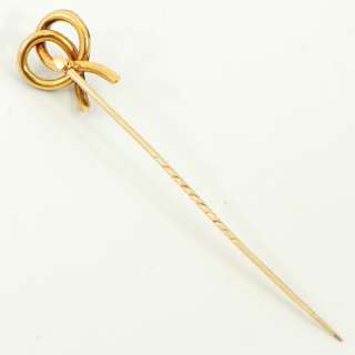 diamond and enamel decorated bow hat pin made in 18 carat gold with 