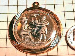 Inca or Egyptian Scene Intagolio Gold color on Gold Plated Medallion 