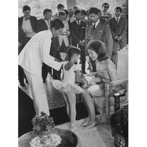 com Jacki Kennedy Greeting a Little Girl During Her Visit to Cambodia 