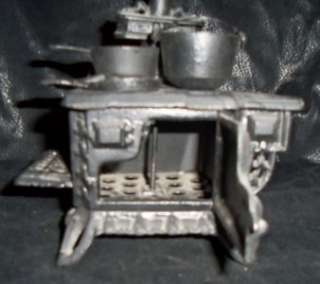   by Dent Cast Iron Miniature Salesman Sample Stove Toy w/ Pots Pans