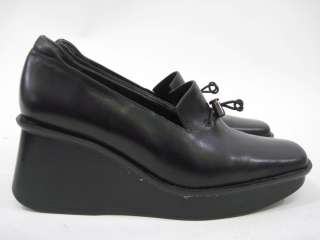   andrew stevens black leather wedges heels in a size 38 8 theses shoes